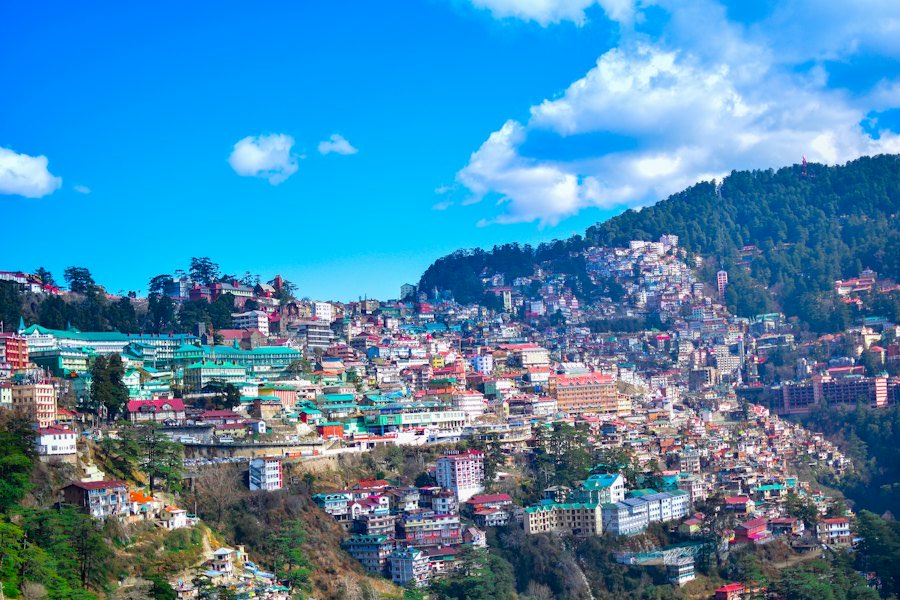 Shimla town spread across green hills
