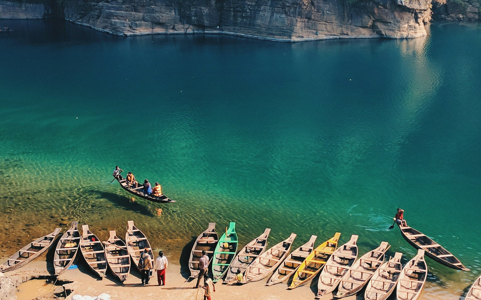 Wooden boats on the clear Umngot river at Dawki, Meghalaya